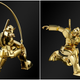 Illustration for article titled Gold Gundam Statues Go On Sale In Japan For Only $240,000